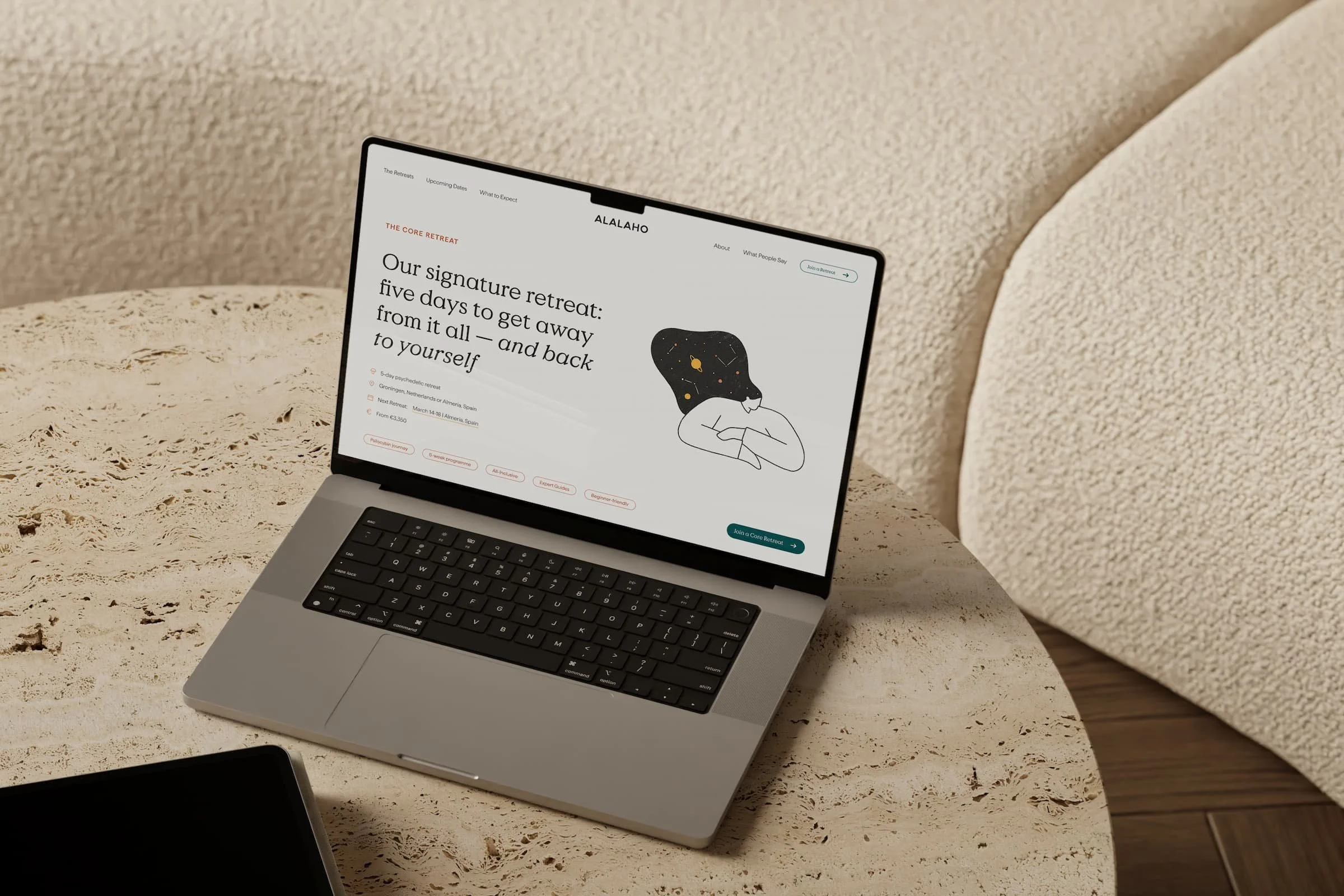 A laptop on a textured beige surface with a webpage open about a retreat, featuring text and a simple illustration of a person with a starry night sky inside their head.