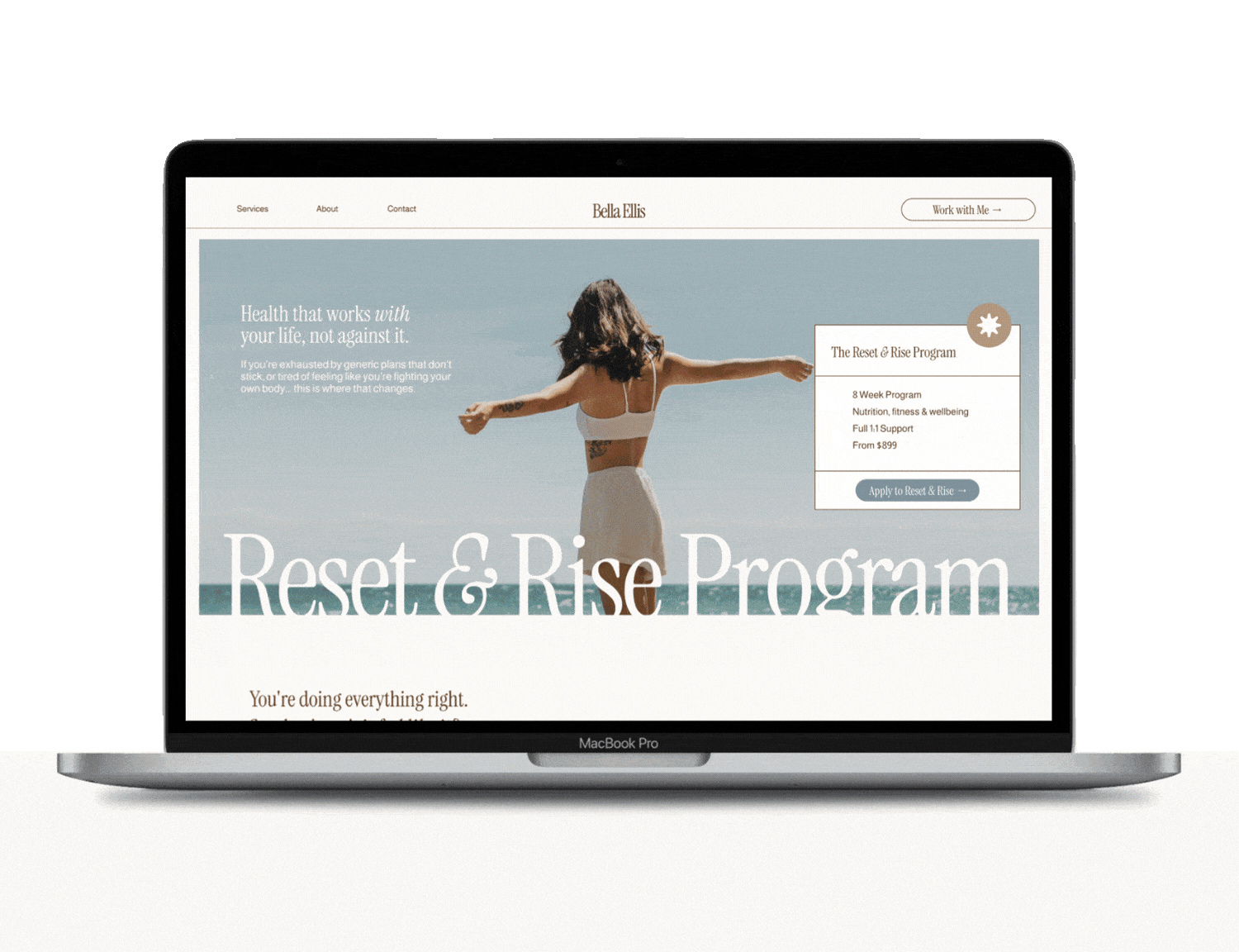 Website homepage on a MacBook Pro screen showing a woman by the beach with open arms, promoting a Reset & Rise Program for health and wellness.
