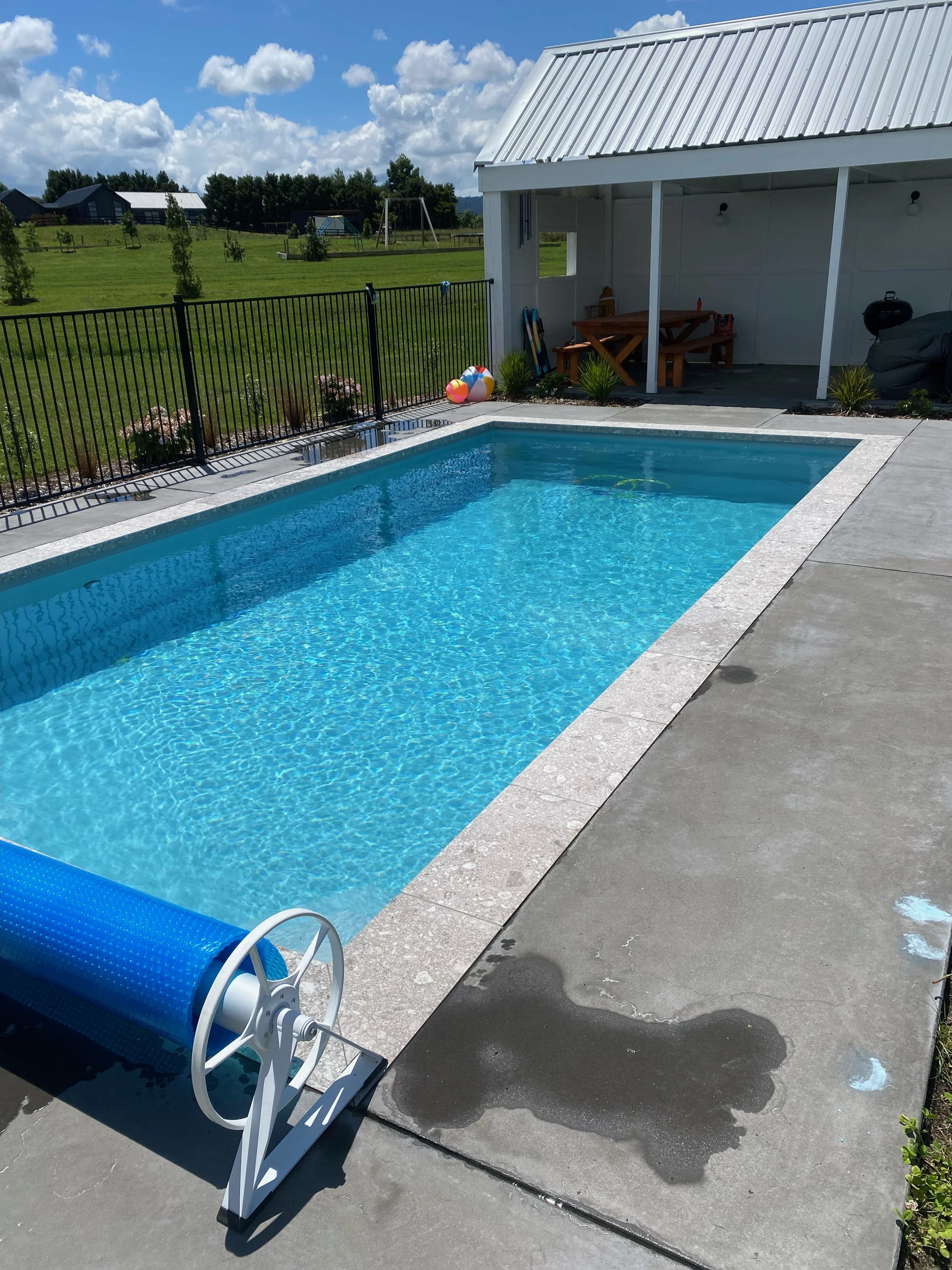 MK Pools River Grey fibreglass pool colour — light blue-grey finish offering a calm, natural water look for contemporary backyards.