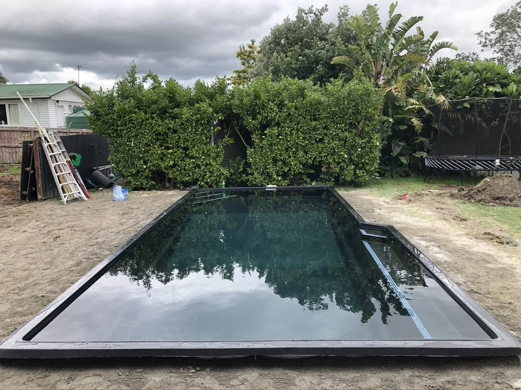 MK Pools Disco Black fibreglass pool colour — dramatic dark finish creating a mirror-like water effect for luxury backyards.