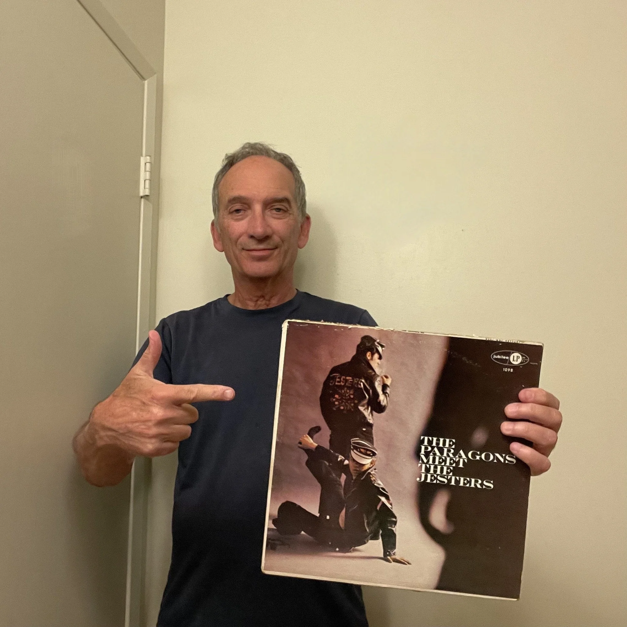 Ben poses with The Paragons Meet The Jesters, released in 1959 on Jubilee.