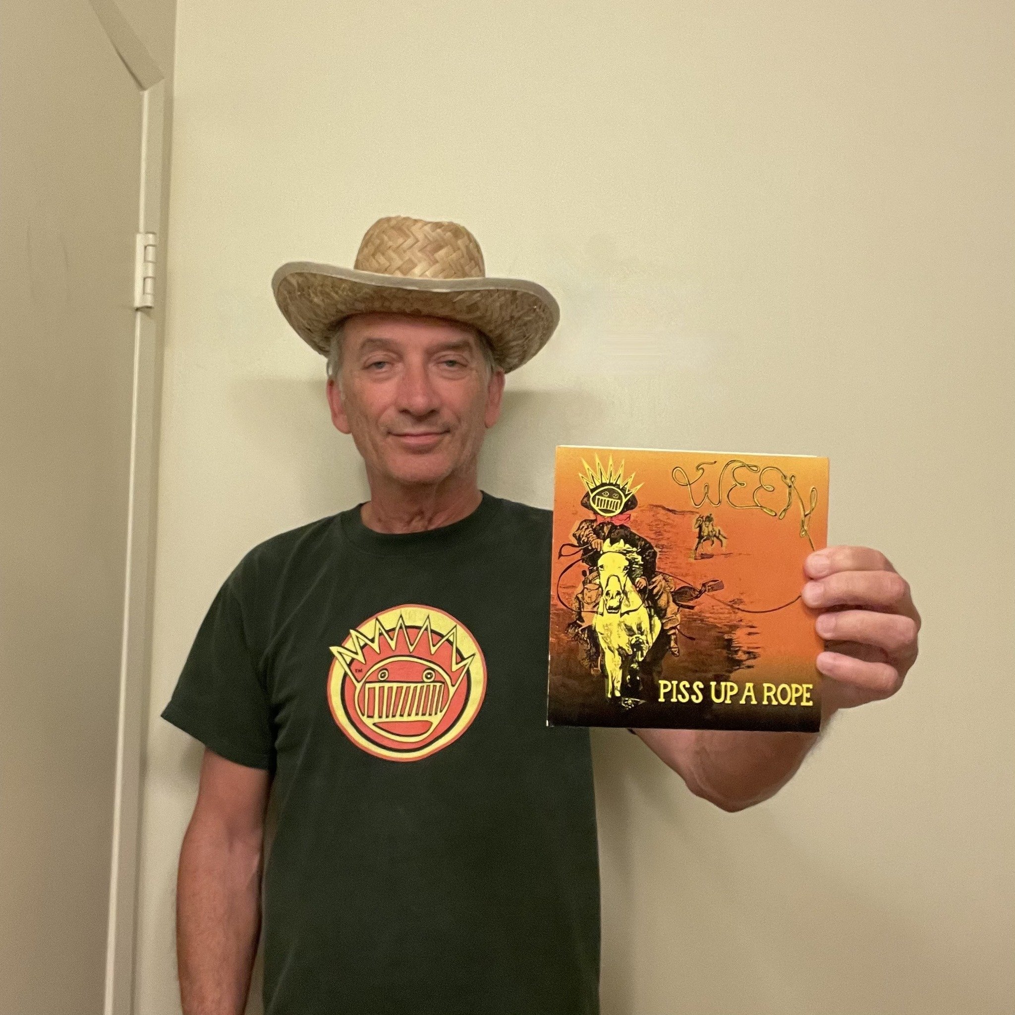 Ben holds the "Piss Up A Rope" single