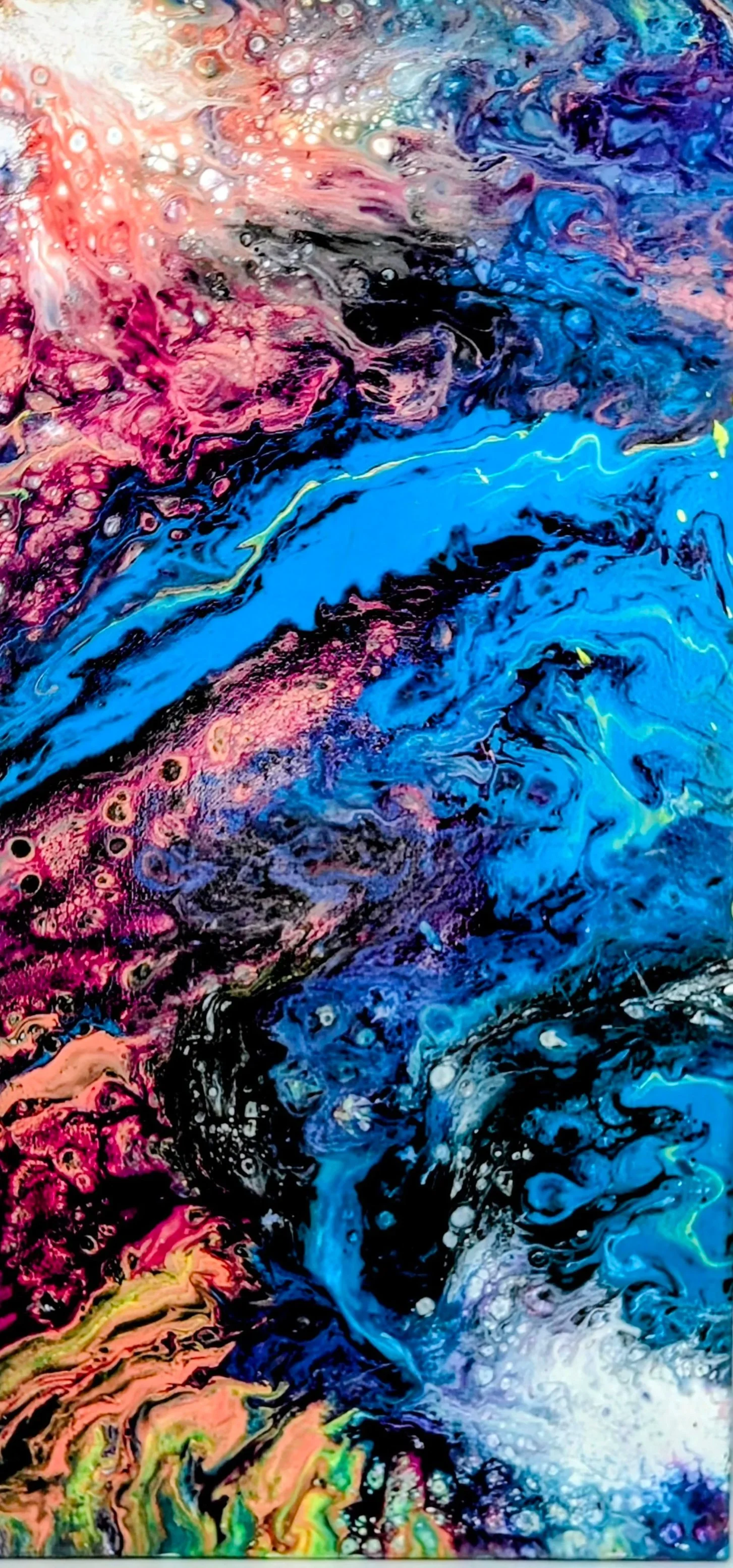 Abstract painting with swirling bright colors, including pink, blue, black, yellow, and white.