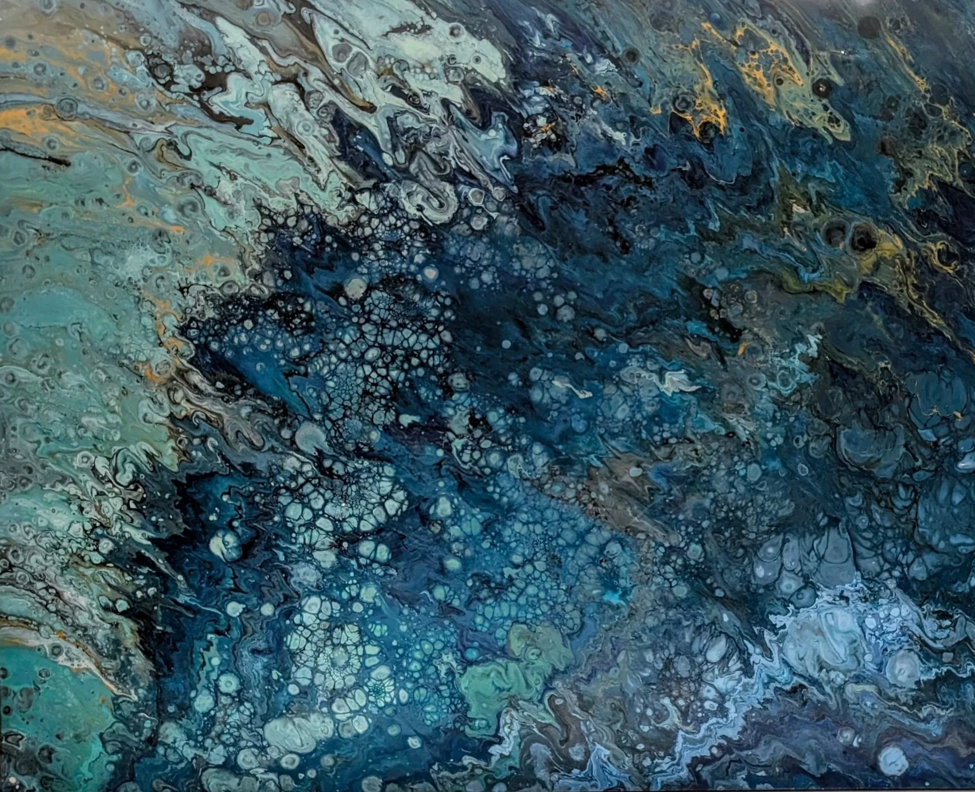 Abstract painting with swirling blue, teal, black, white, and gold colors