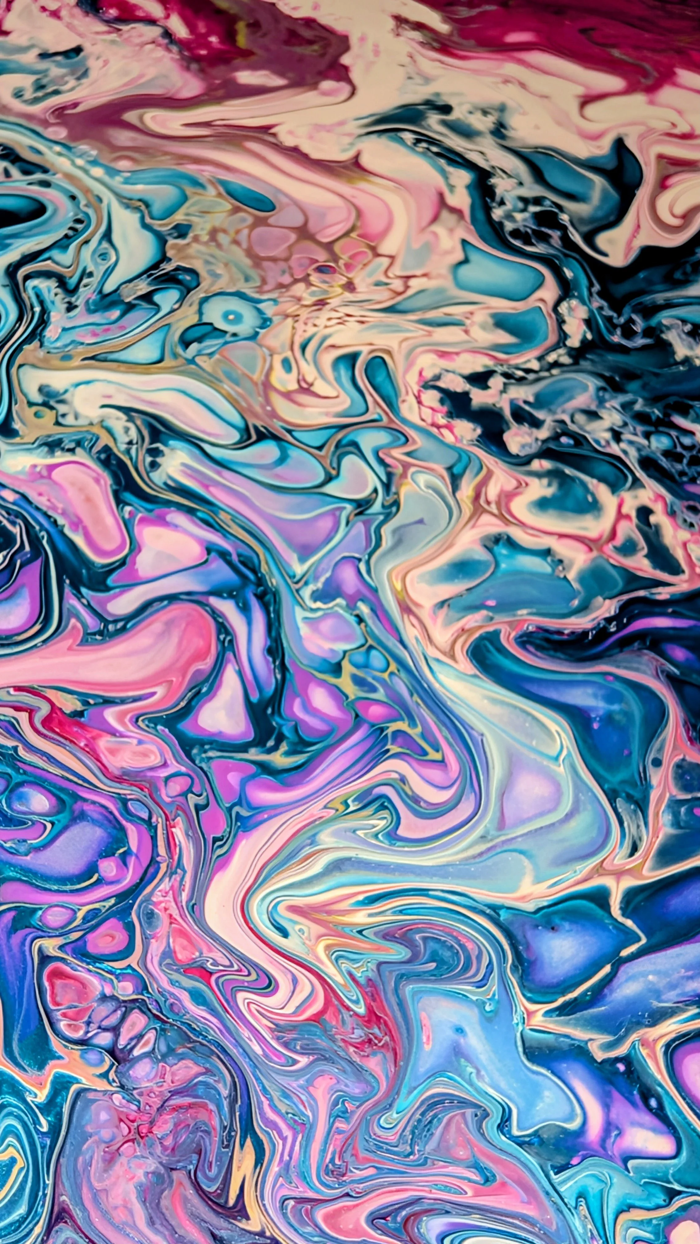 A vibrant abstract painting with swirling patterns of pink, blue, purple, white, and black colors.