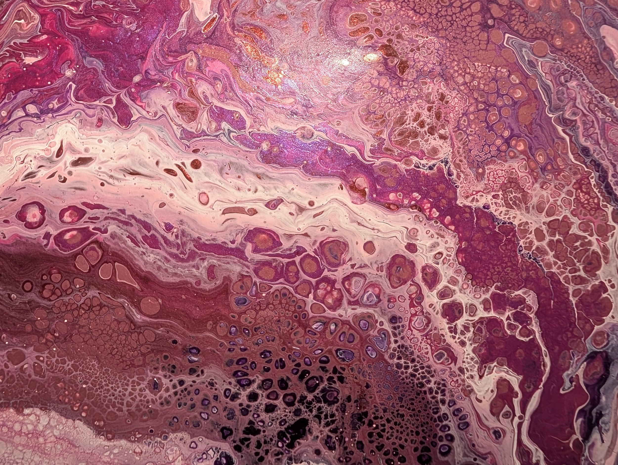 Abstract fluid art painting with pink, purple, white, and black colors creating cellular and marbled patterns.