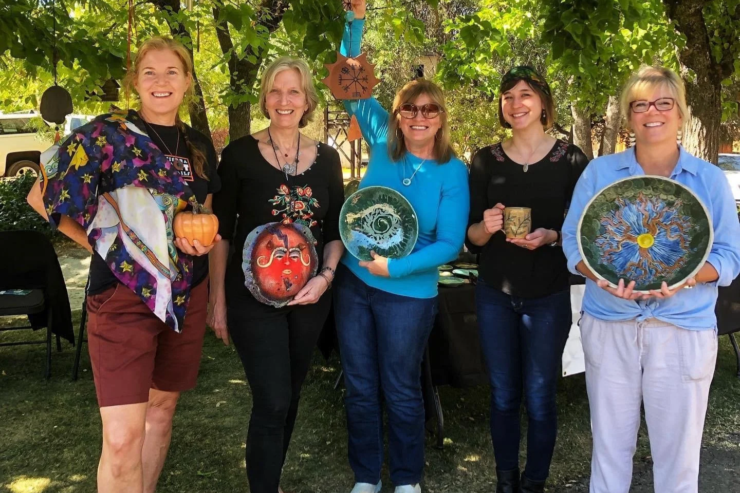 Various ceramic vases in blue and orange