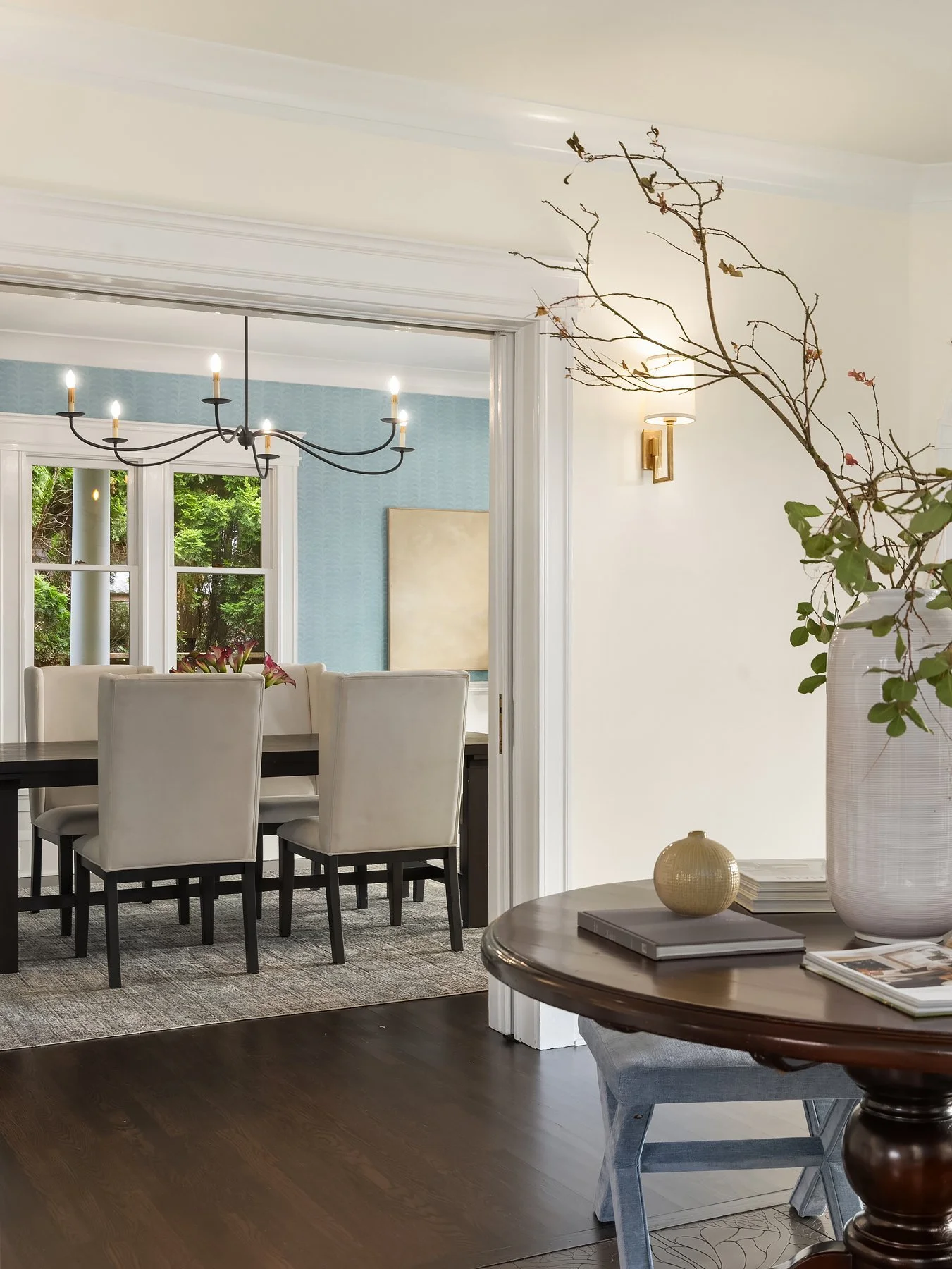 View from the living room into the staged dining room in a Seattle home