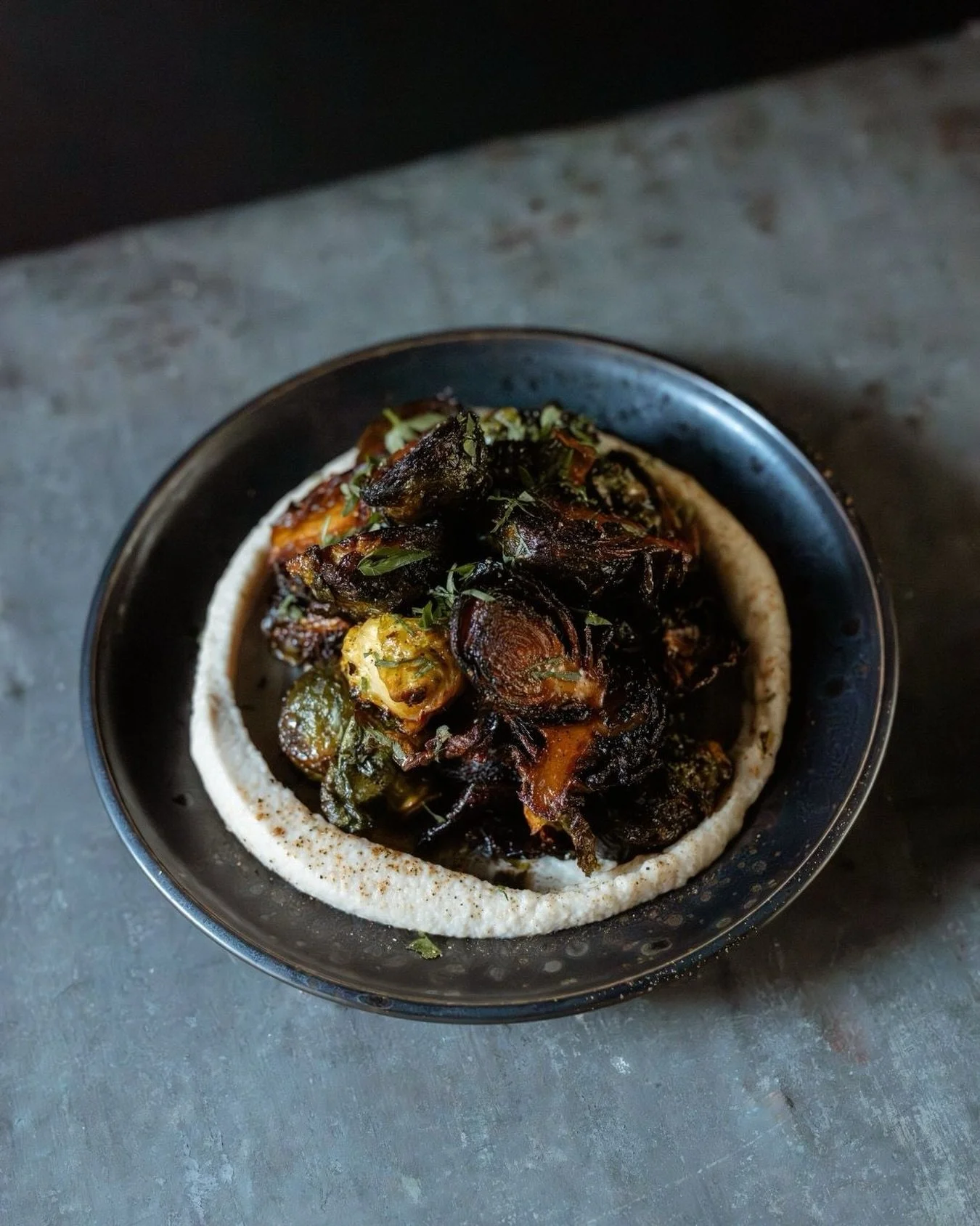 Brussel sprouts, wakame, butter bean, confit garlic. 
This is what the season tastes like at Rātā. Reserve your table this winter via the link in bio.