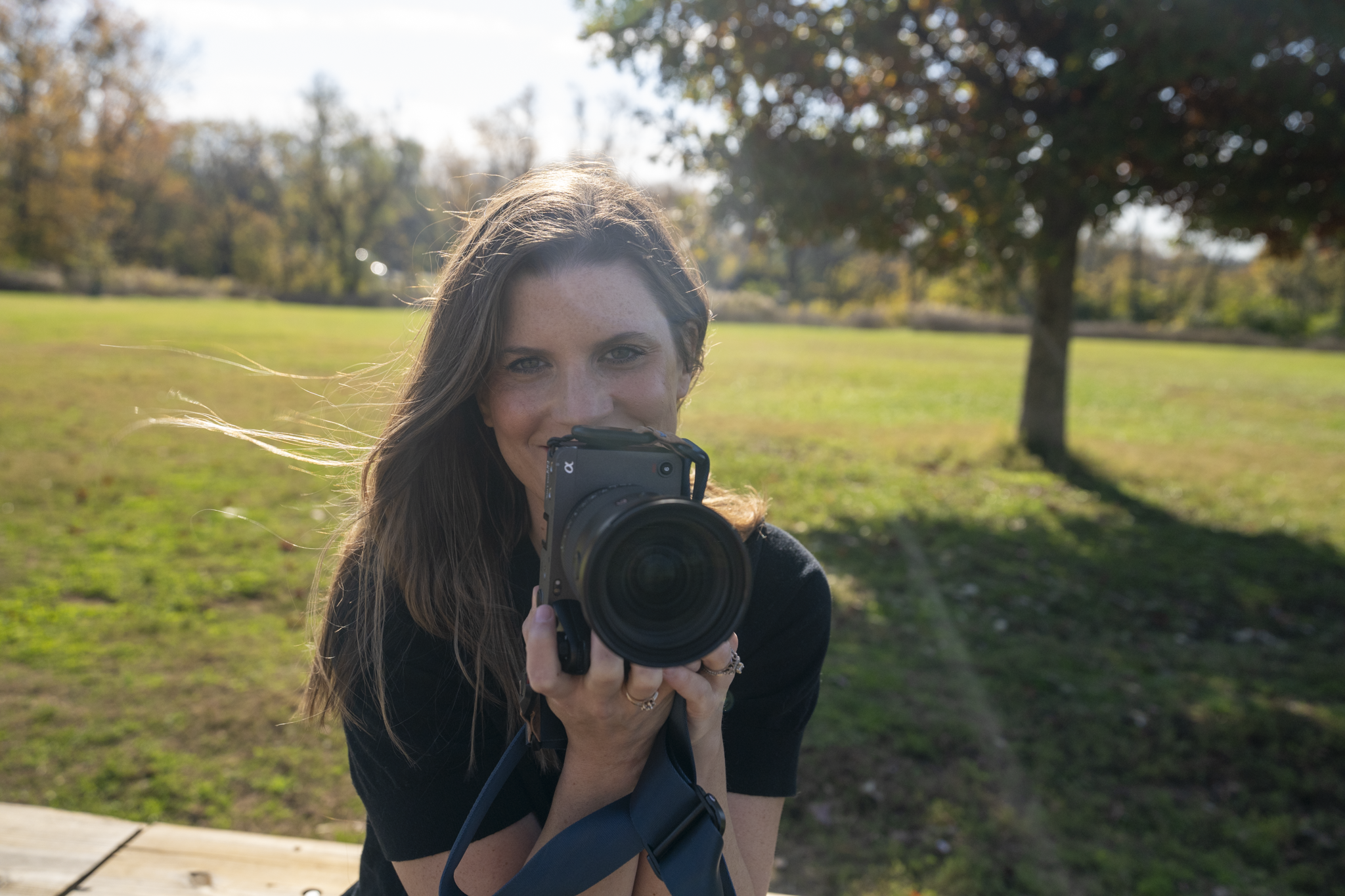 Documentary filmmaker Tara O’Brien photographing a family film on location in Kentucky, capturing real-life moments with her camera