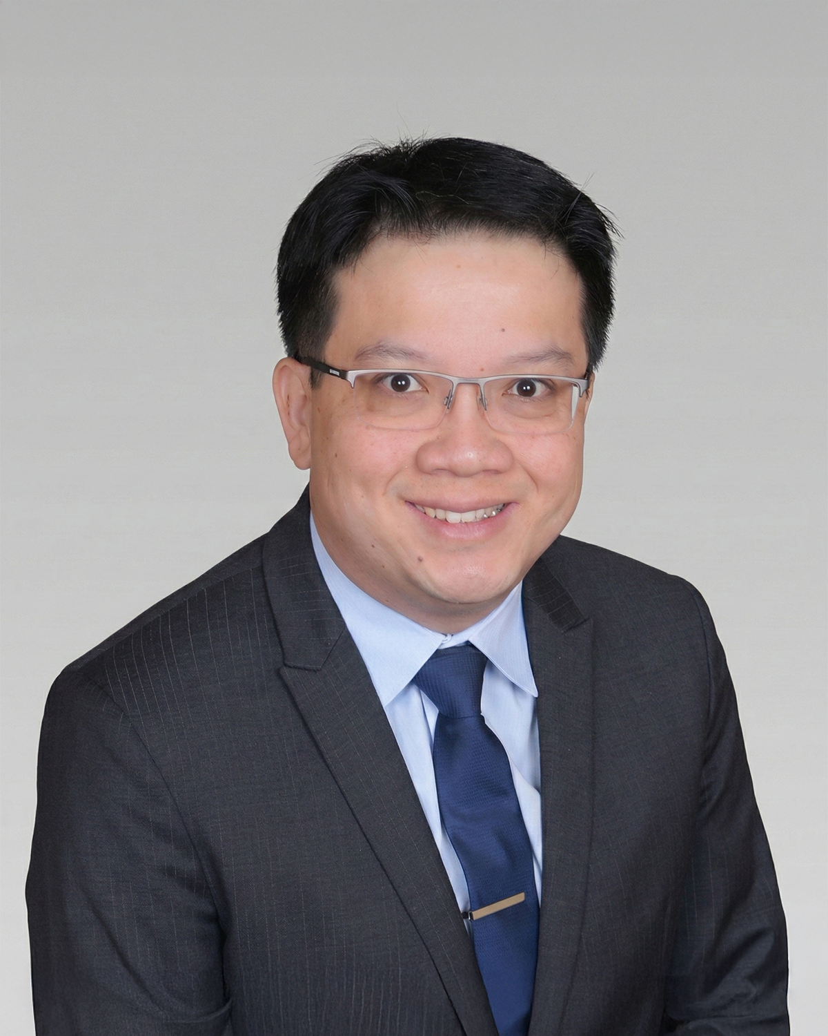 Headshot of Caleb Hing, SPDI