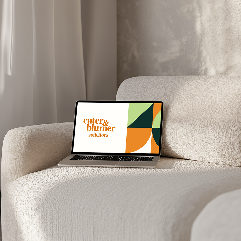 Satie Laptop Mockup.png