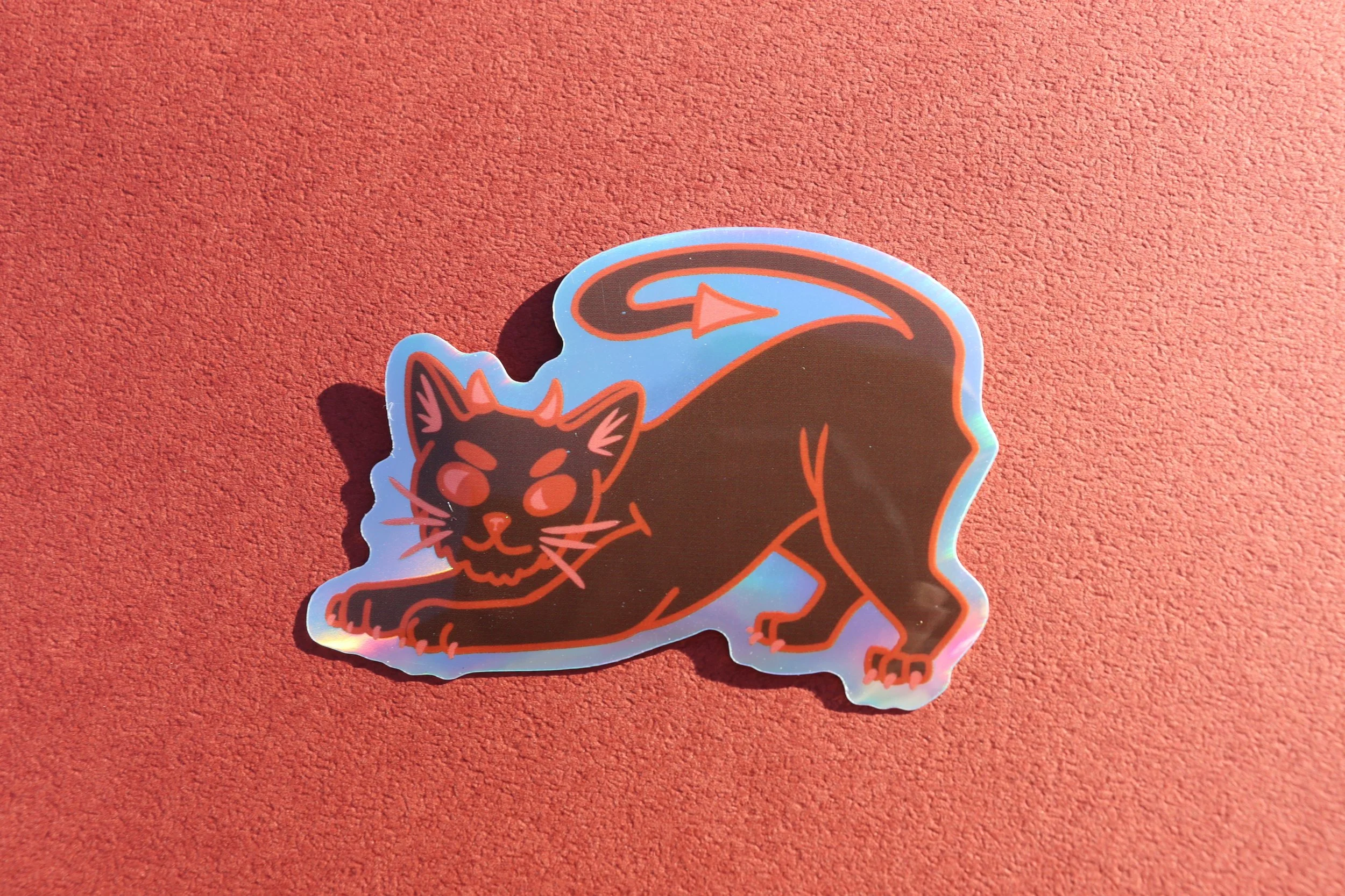 Devil Cat Red BG.JPG