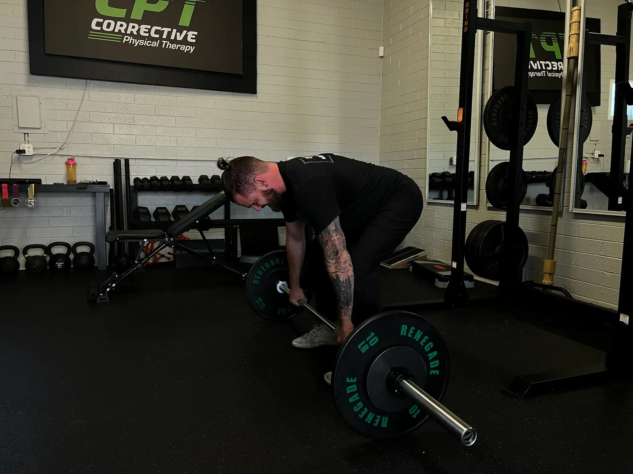 physical therapy treatment in Scottsdale for wrist injury while lifting weights.
