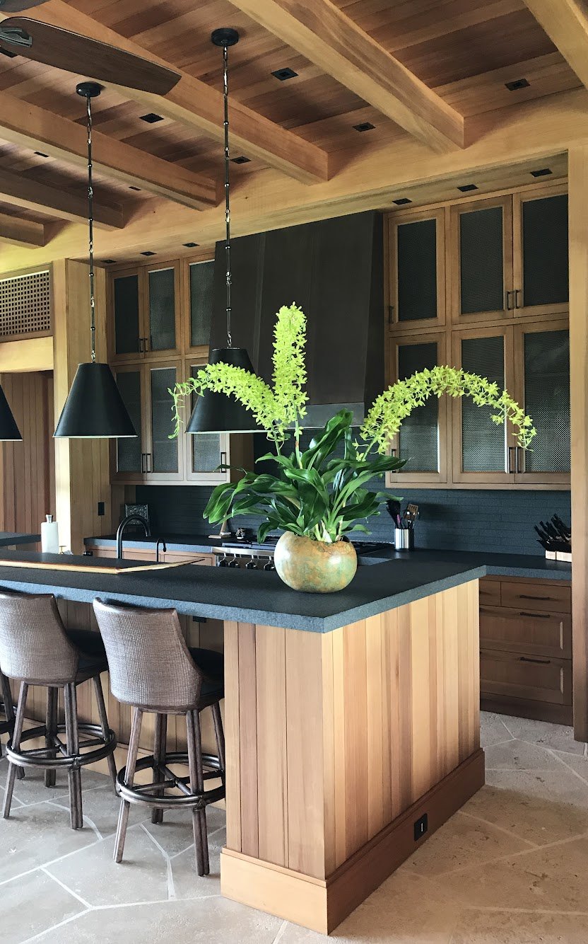 Modern kitchen countertop island featuring a carefully curated orchid design by Christine L ʻOrange.