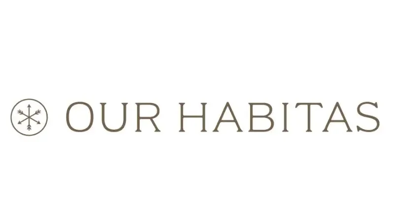 Our Habitas logo with a circular symbol containing a snowflake design to the left of the text