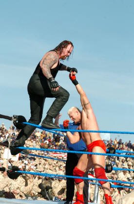 The Undertaker at Tribute to the Troops vs Heidenreich going old school (Photo taken by unknown US Army Soldier)