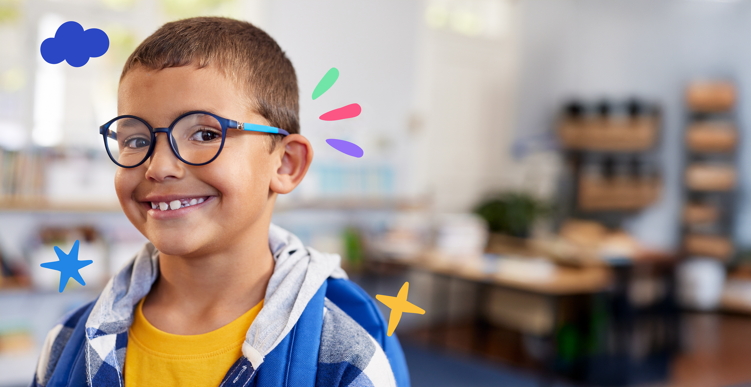 Happy child in school smiling at camera