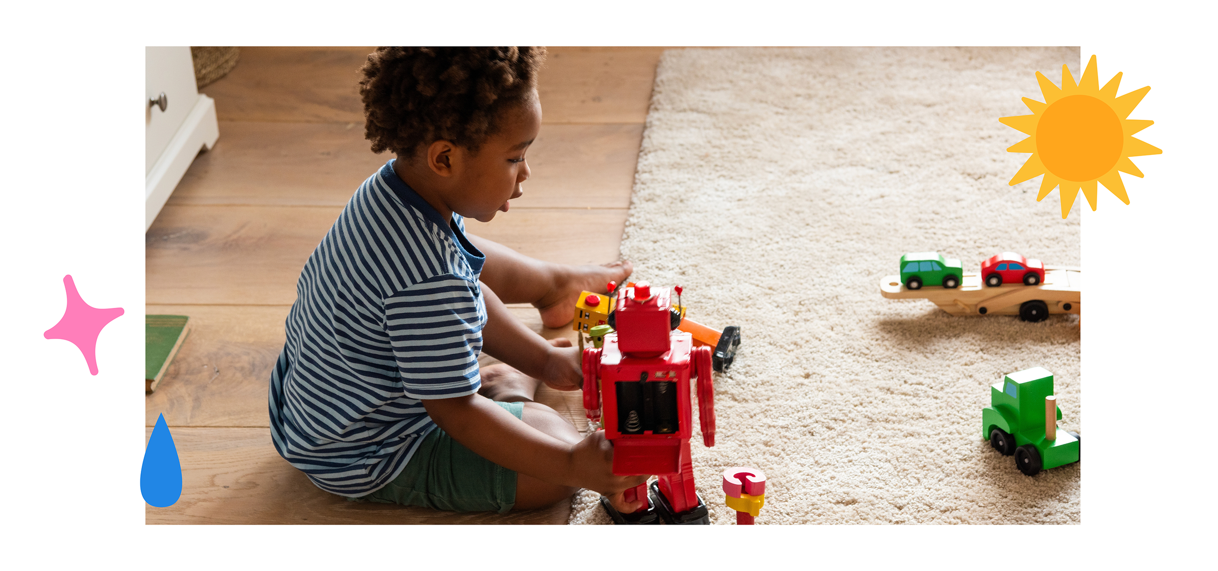 Child sitting on floor playing with toys
