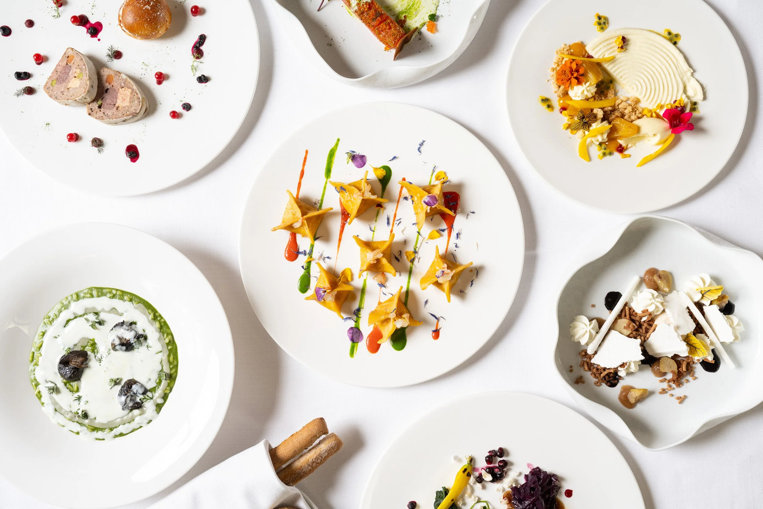 Beautiful plates for Italian food presented within the restaurant.