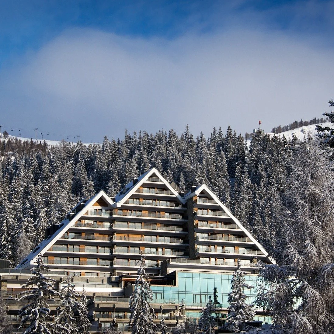 There&rsquo;s a place in Crans‑Montana that reminds us how much beauty, warmth, and connection this region still holds. ✨

The Crans Ambassador rises above the valley with panoramic Alpine views, a glowing terrace fire, and a spa that feels like a de