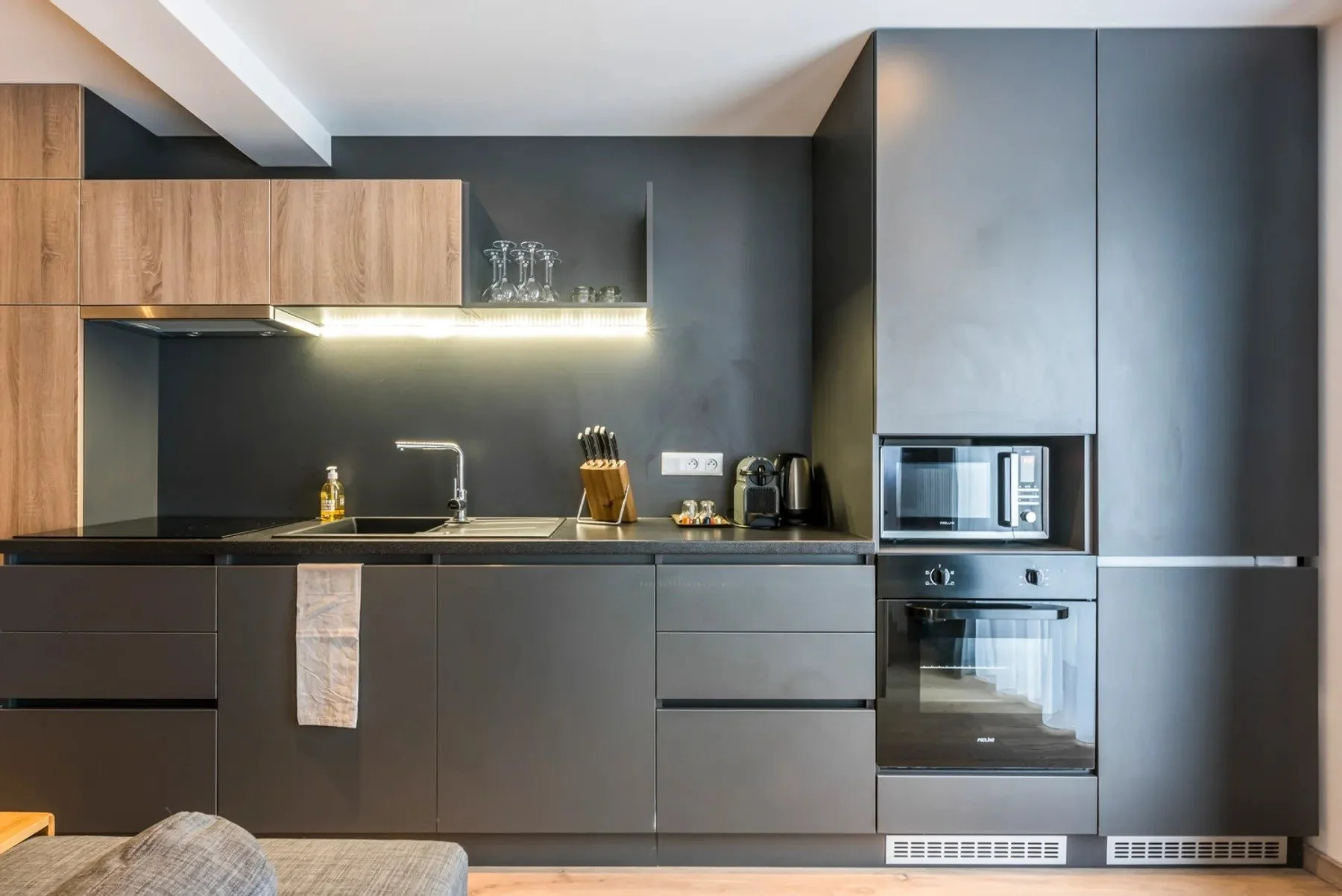 Self catered kitchen within Apartment Bosson. Newly renovated, high quality finish. Slate grey and wood design.