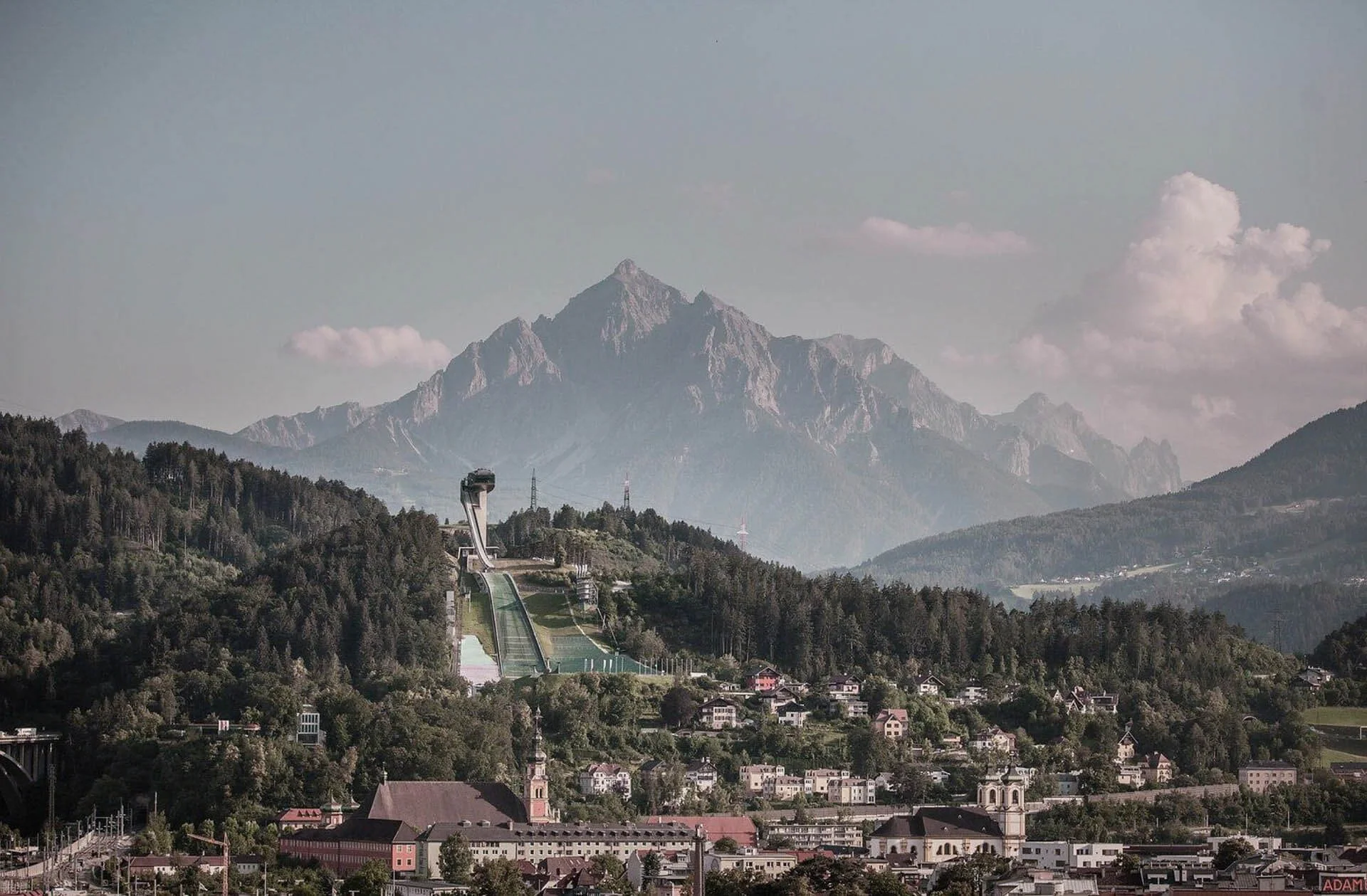 Skyline view of Innsbruck with the ski jump in the background on a winters day.