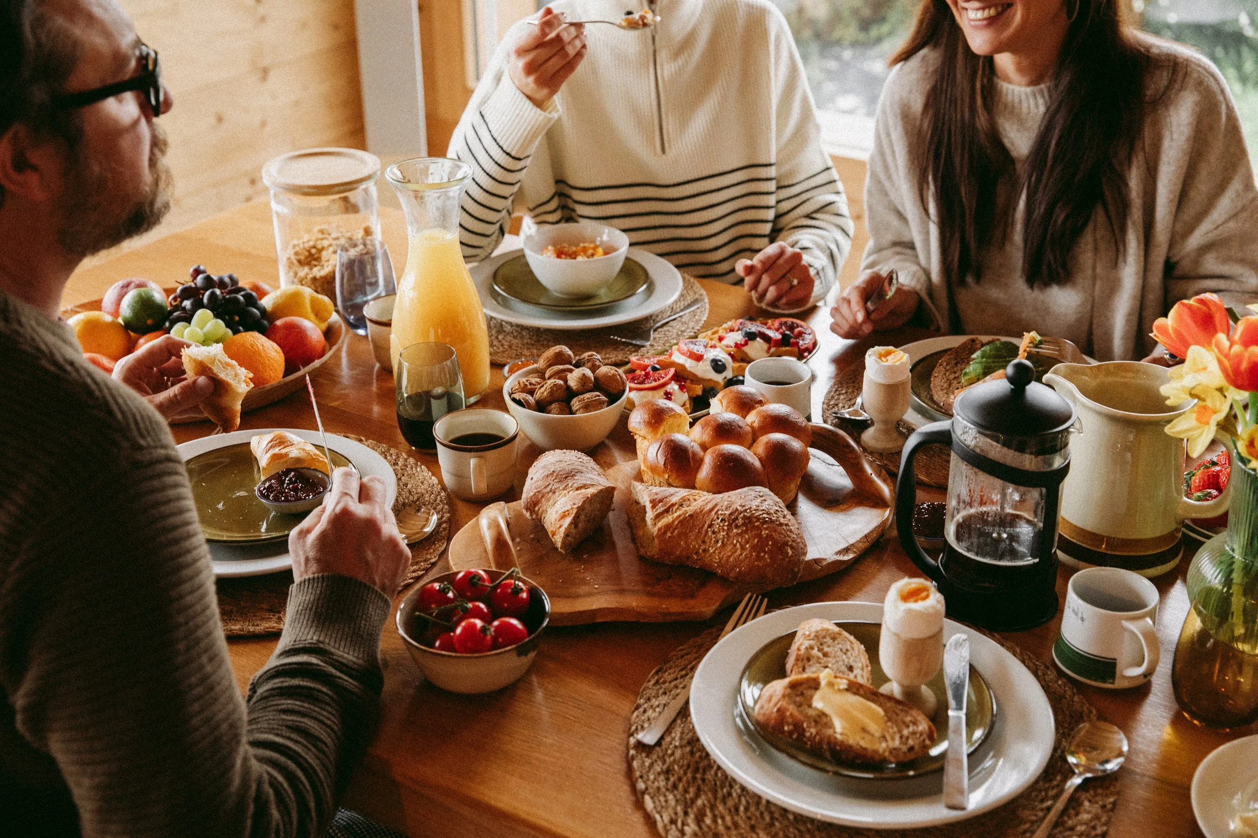 Catered chalet breakfast. Plenty of croissants, breads, juices and granola options.