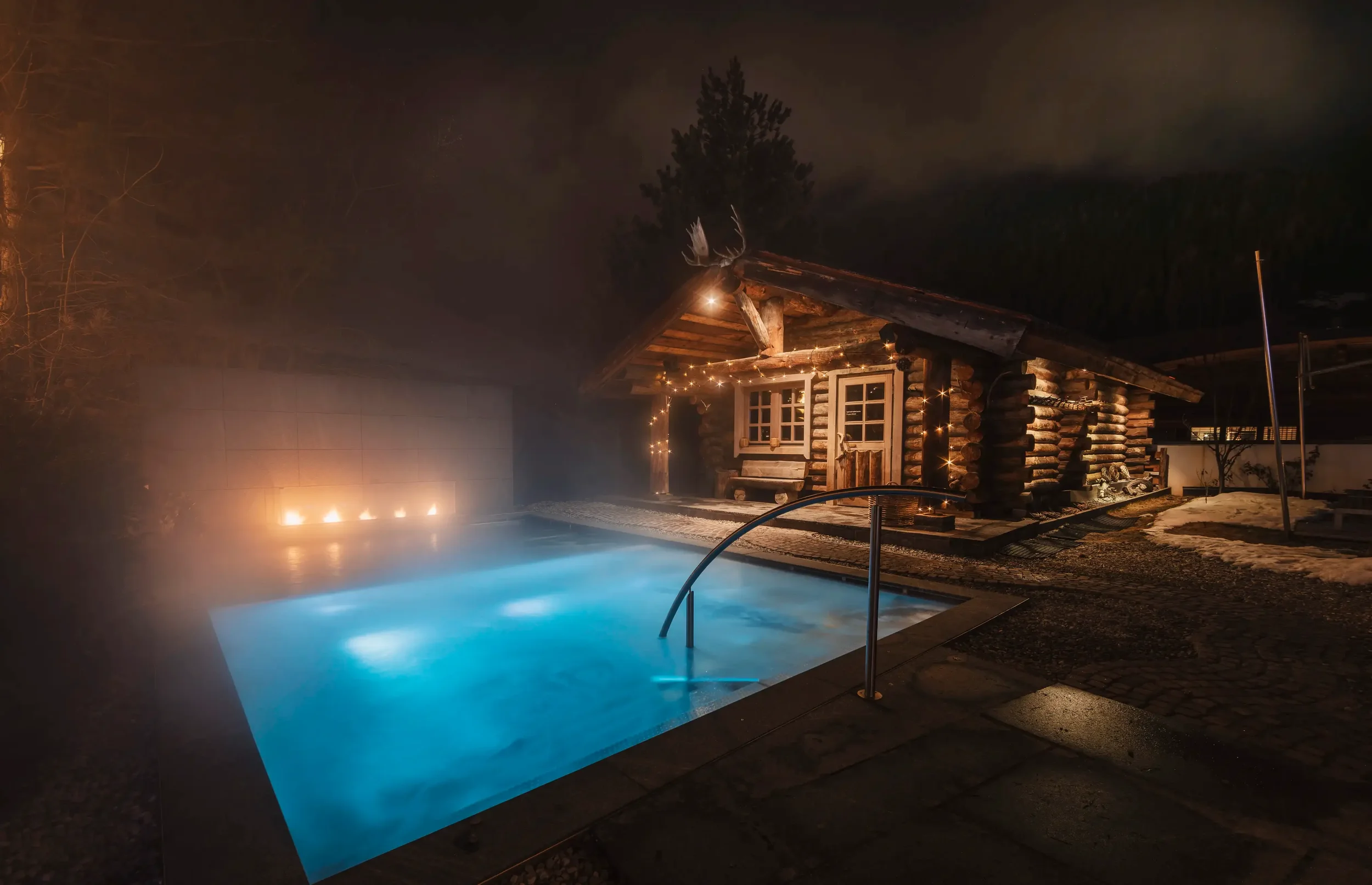 Hotel Madlein Exterior Pool - Powder Pines Travel.webp