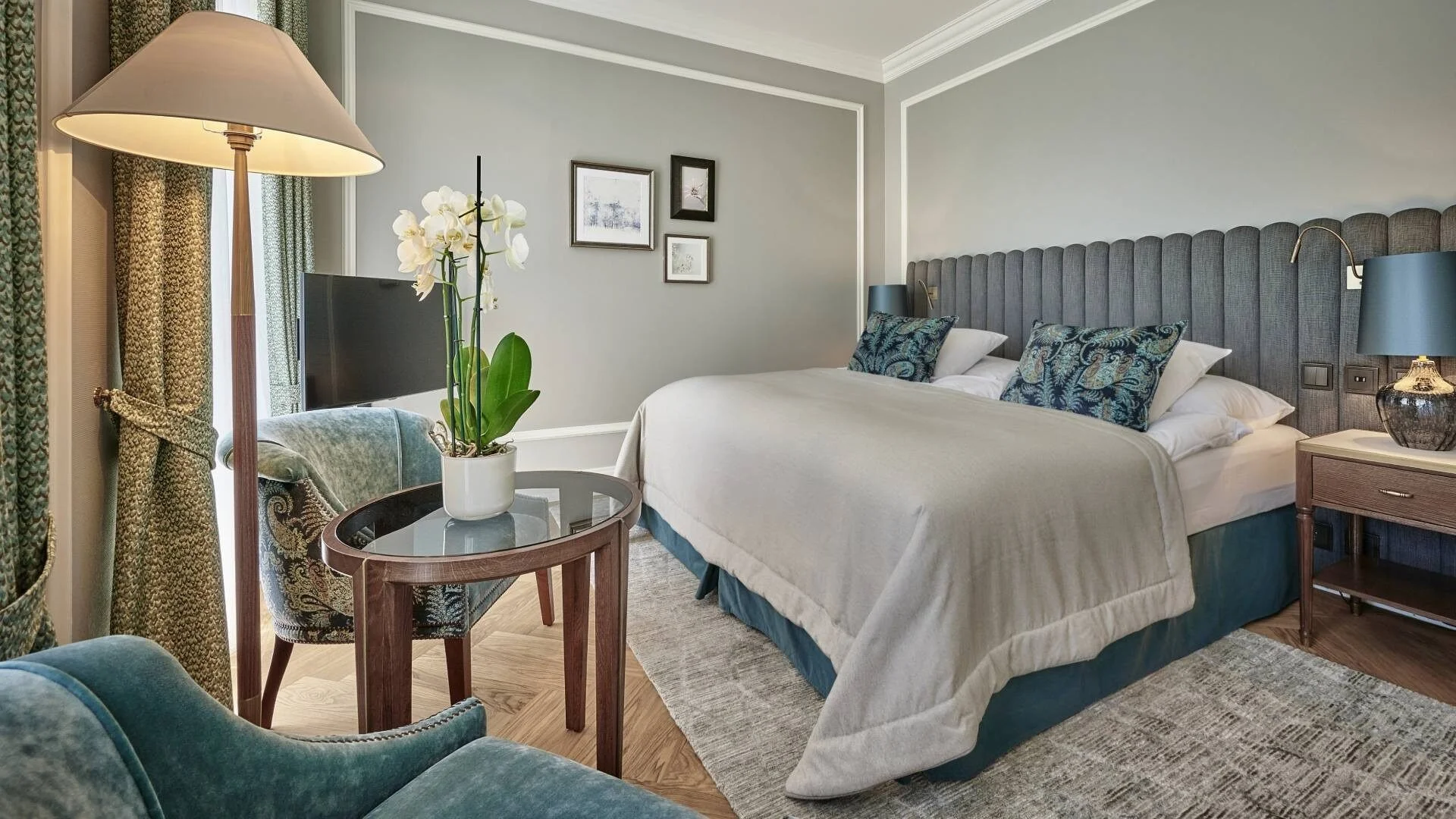 Deluxe Double Room with blue décor throughout the bedroom. Very soft and warming.
