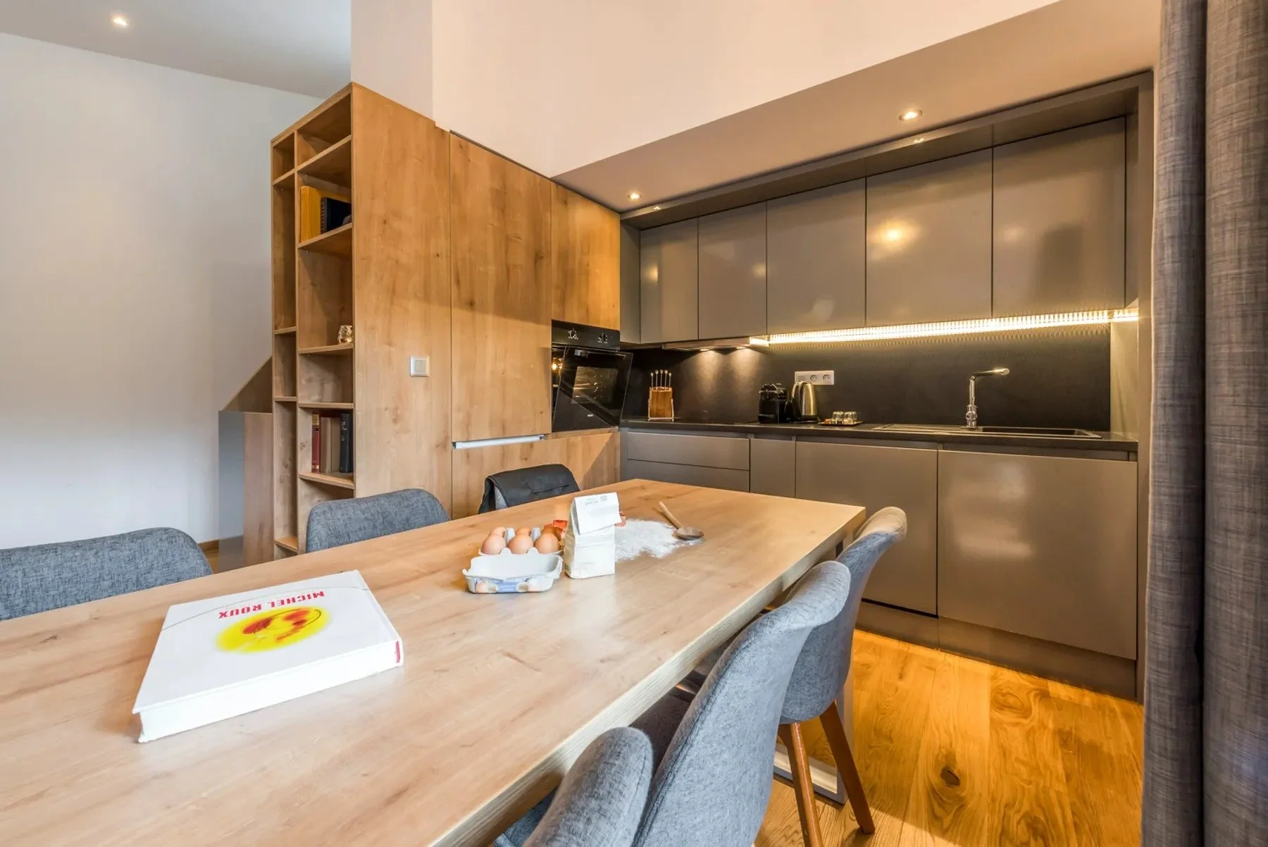 Light dining area within the kitchen area creating a social space within.