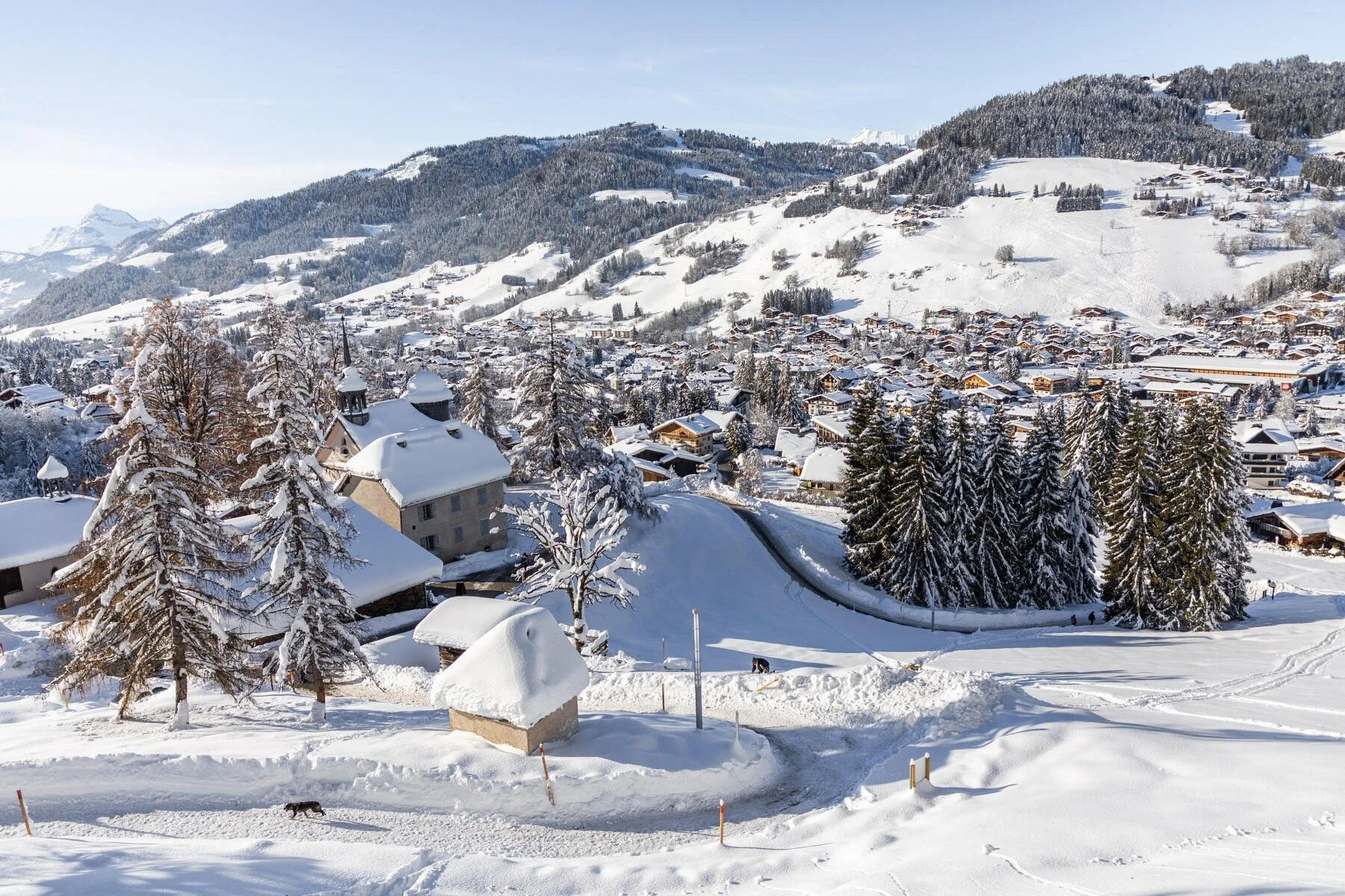 Fresh powdery conditions in Megeve with fresh snowfall on the rooftops of the properties below in the valley.