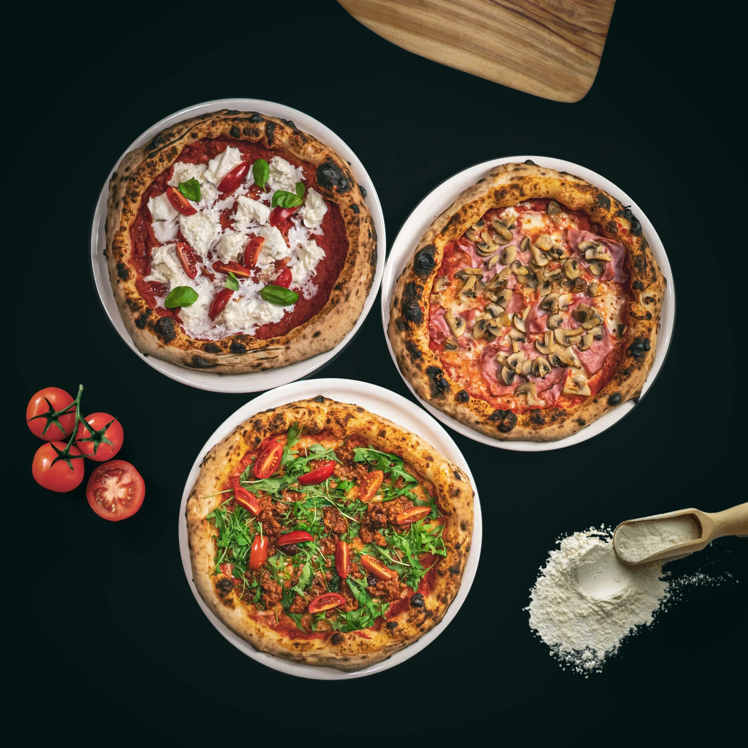 Three different pizza options all freshly made