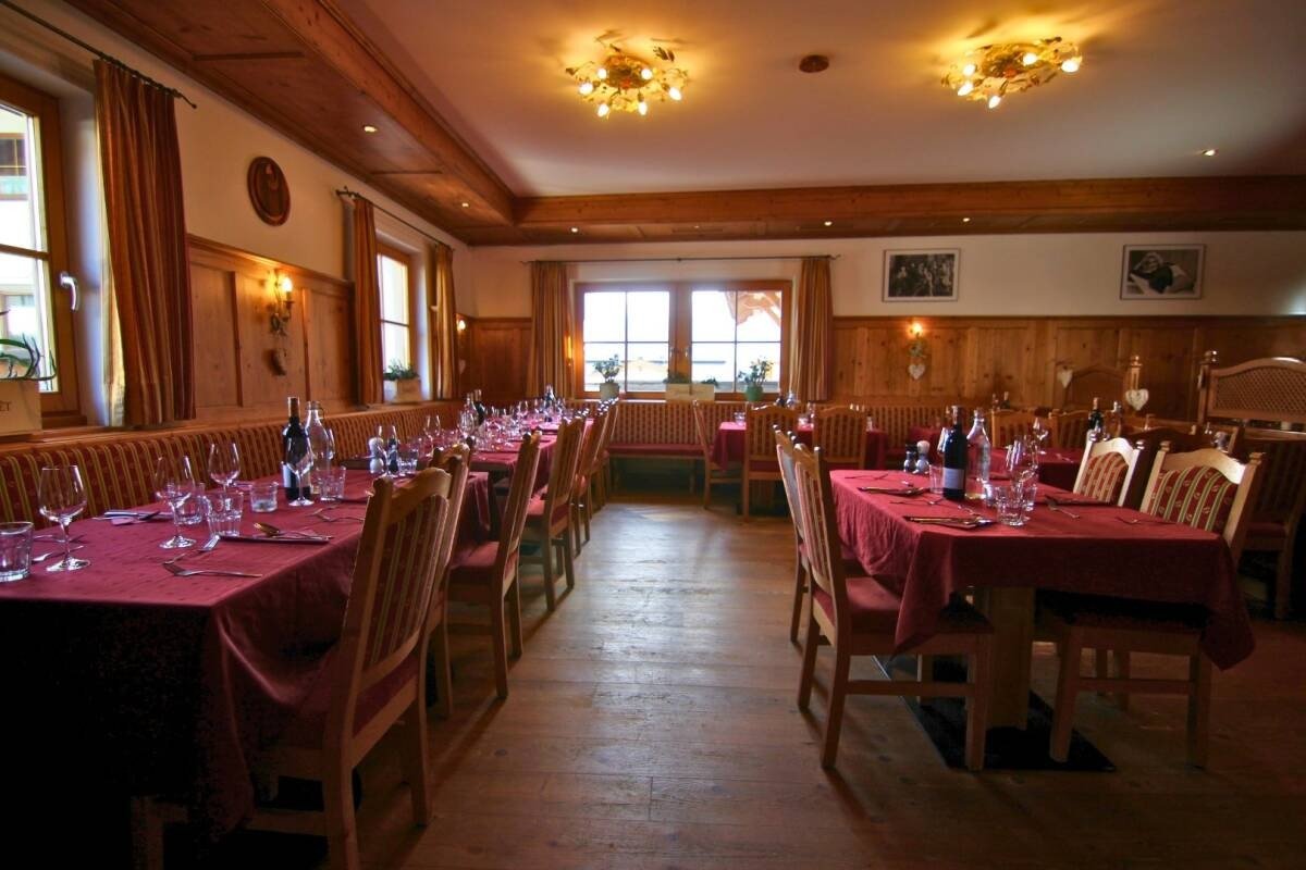 Tables set ready for dinner at the Chalet Elfriede within Fiss. Catered chalet.