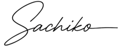 Nighttime city skyline with lights reflecting on the water