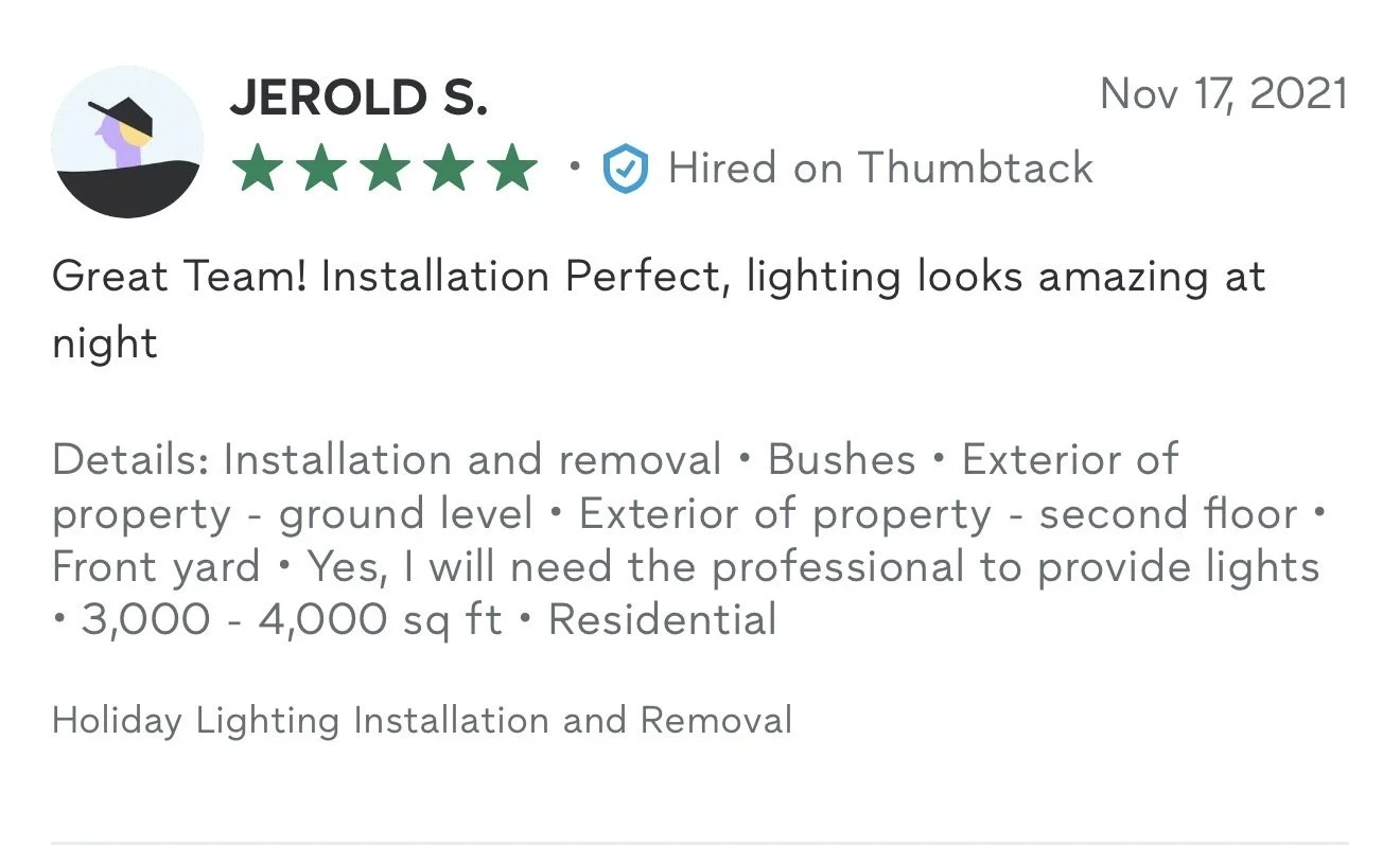 Customer review for holiday lighting installation with a five-star rating from Jerold S., dated November 17, 2021, mentioning installation quality, lighting appearance at night, and details of the service including exterior and yard lighting for a re