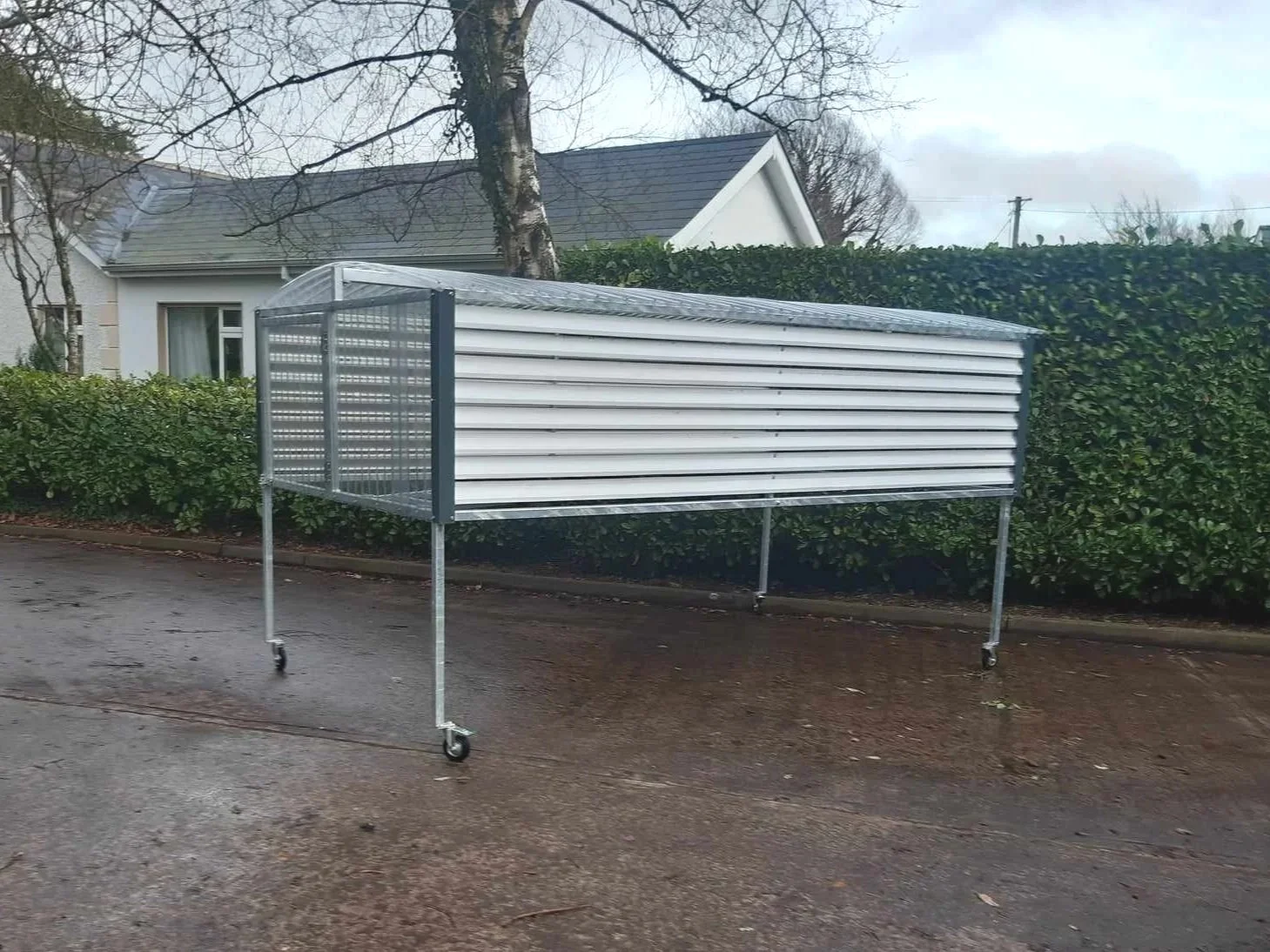 A Washin Wagon, covered washing line shown in on a lineway
