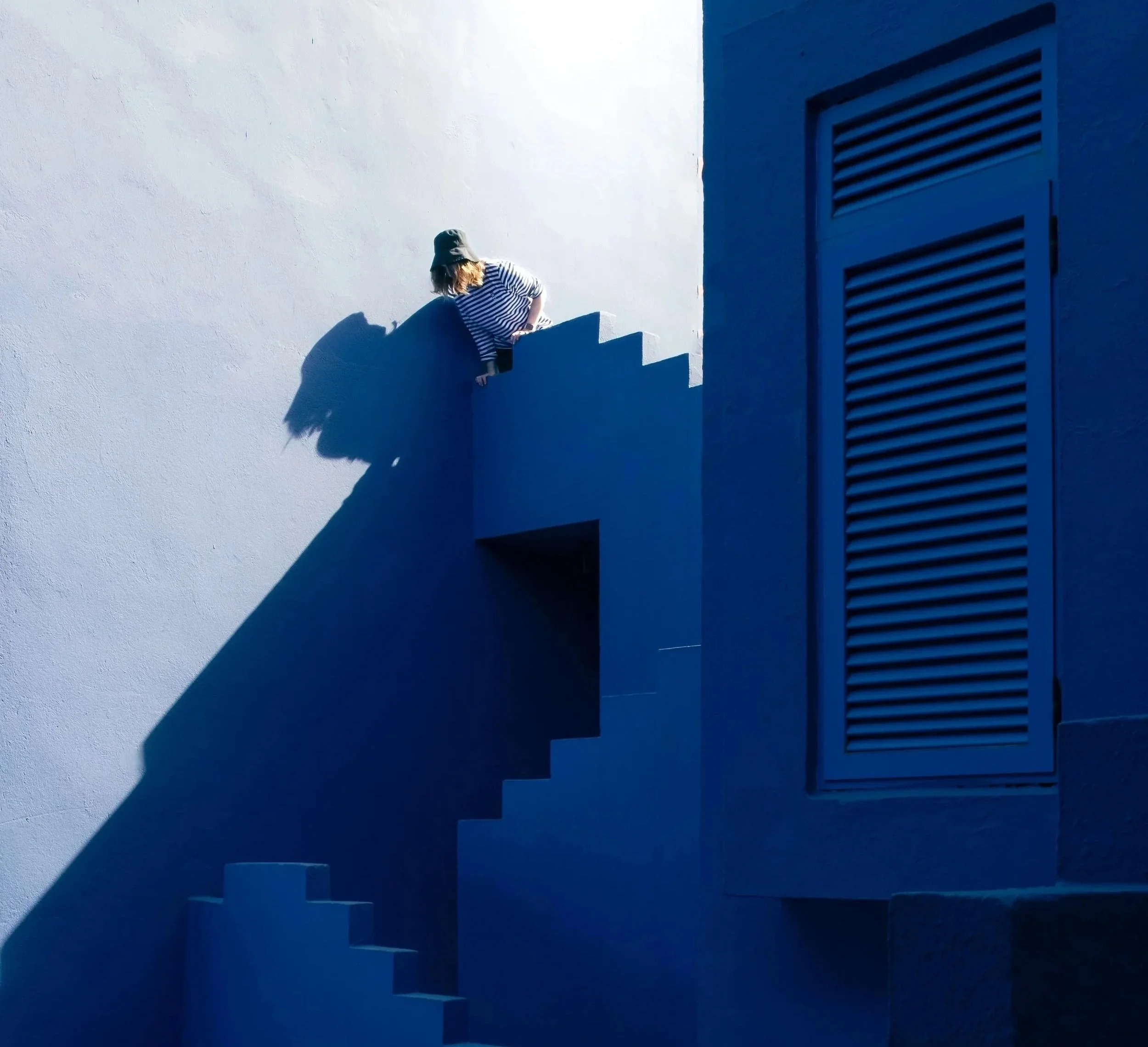Woman-on-blue-stairs