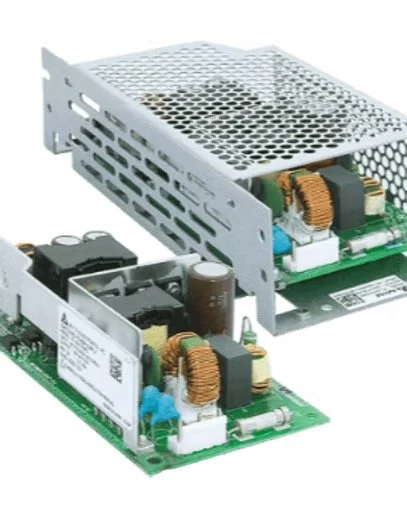 Two power supply units with green circuit boards, metallic heatsinks and electronic components, one with a metal vented enclosure.