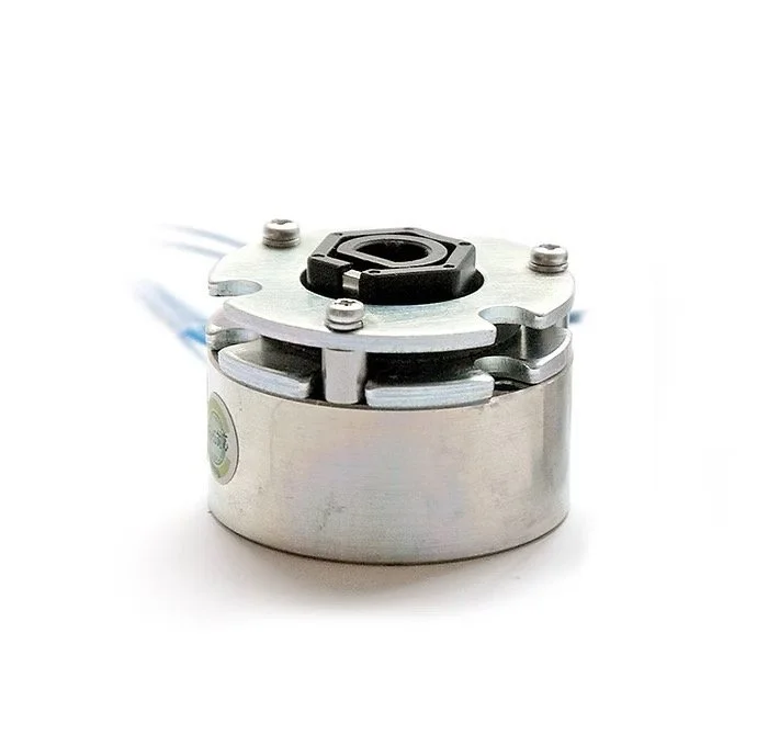 Close-up of a small electric motor with metallic housing and black mounting components.