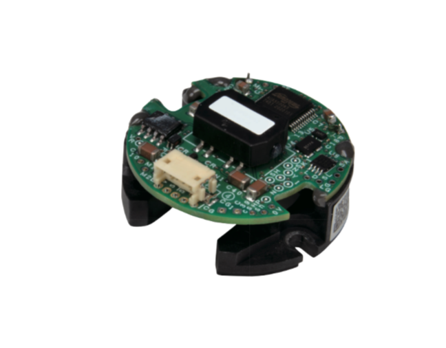 Close-up of a gyro with various components, mounted on a black plastic base.