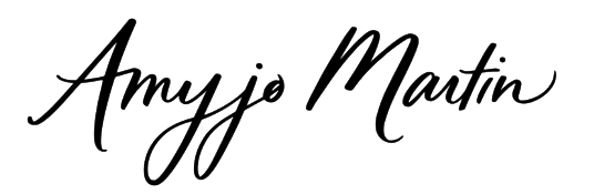 Signature of Amyjo Martin in cursive handwriting