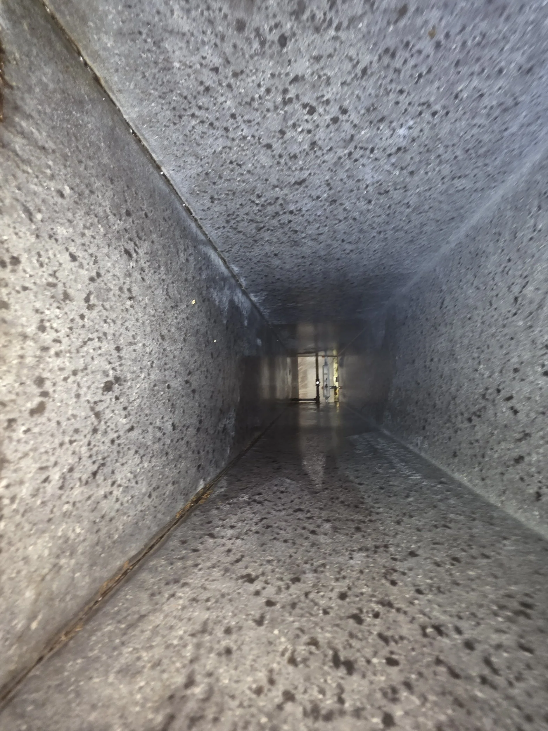 Commercial kitchen exhaust duct after professional hood cleaning in Tampa Bay, FL