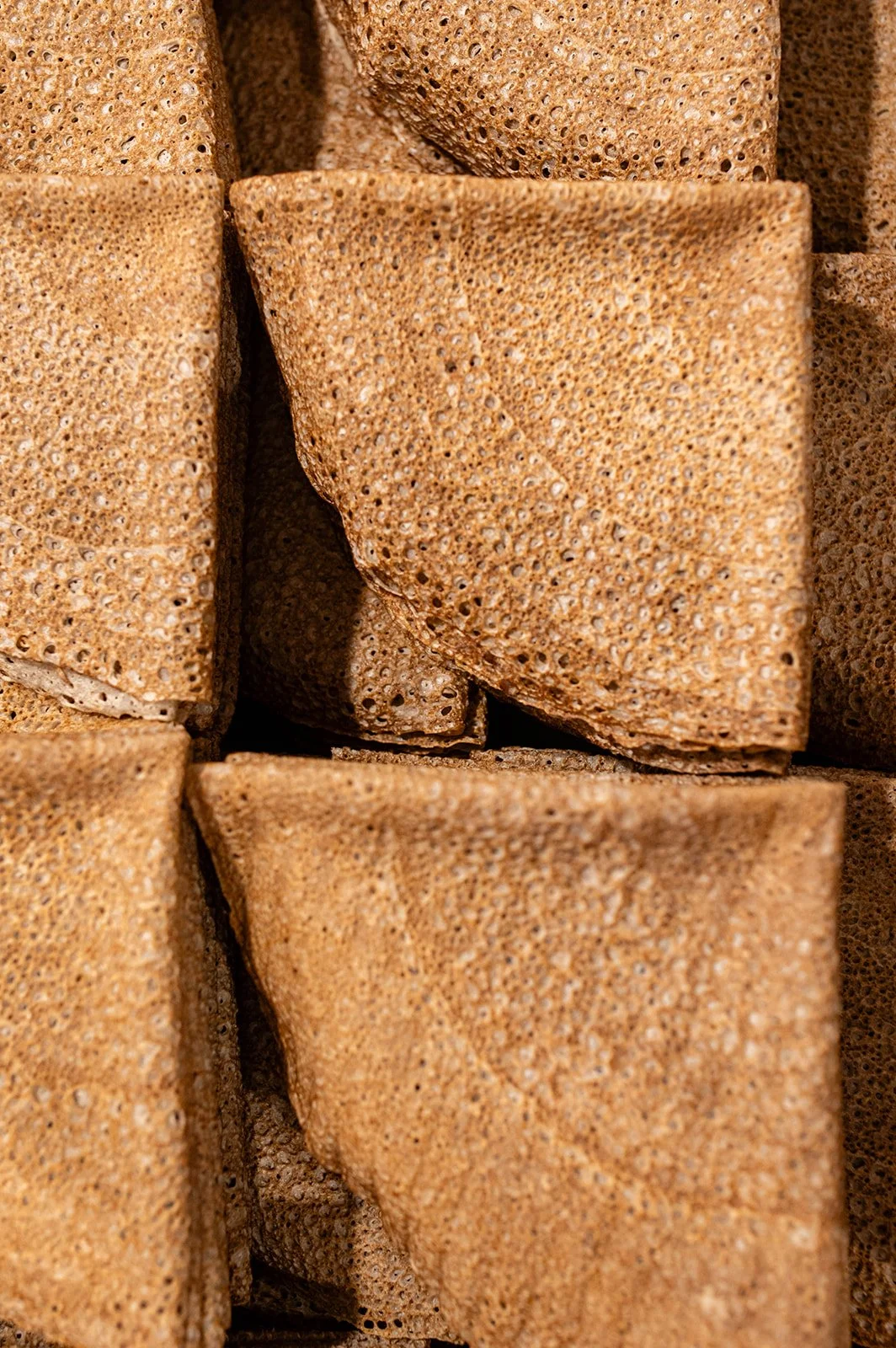 Bar of soap in walrus form with a porous texture.