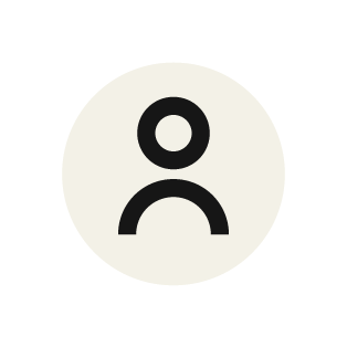 Icon representing a sad face with a black circle and a white background.