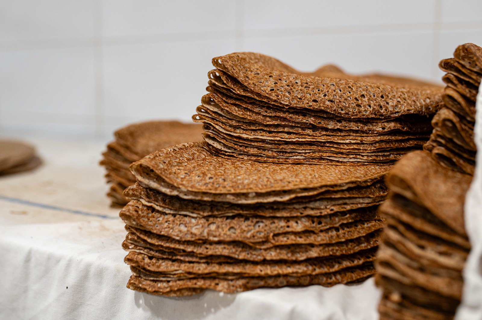 Stacked buckwheat pancakes.