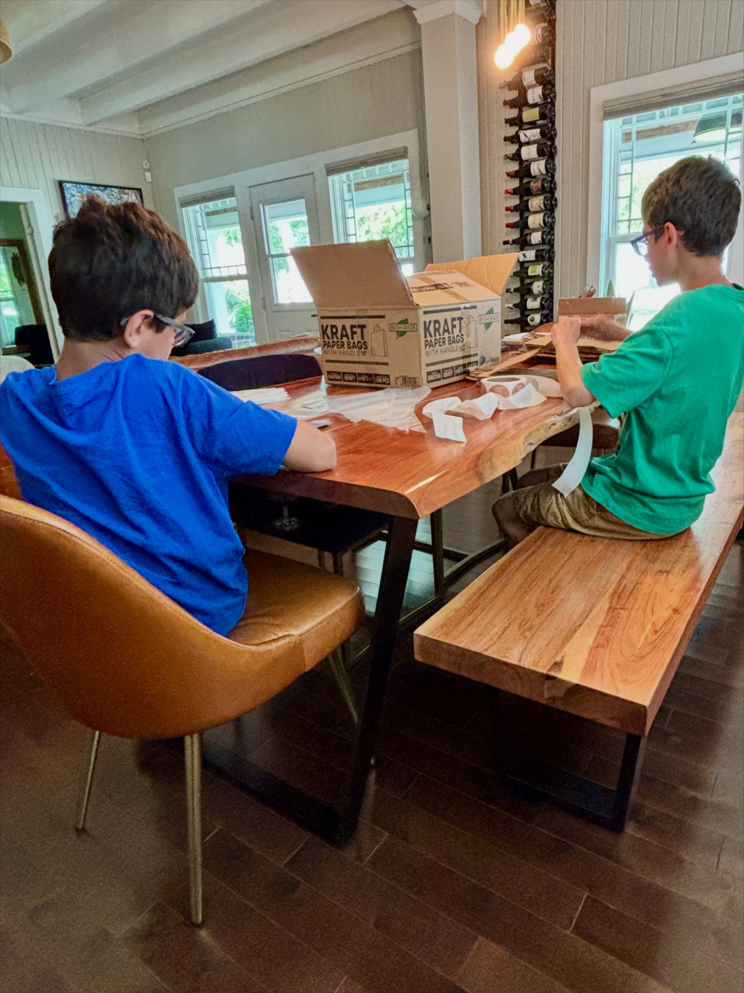 It takes a village to run a business, and today that village included two of my nephews, who spent a chunk of their PD Day helping with the important task of branding our bags.

Behind every small business are people who show up, pitch in, and cheer 