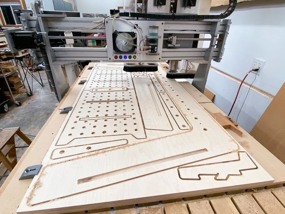 CNC machine cutting plywood