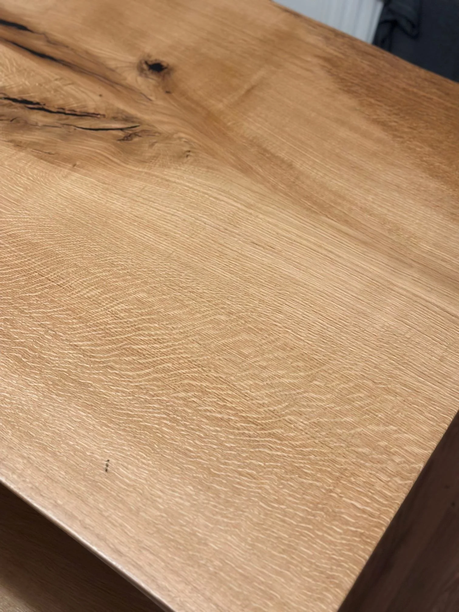 Close-up detail of natural timber grain used in bespoke furniture