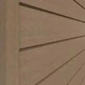 Close-up of a wooden wall with horizontal planks and a corner detail.